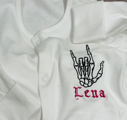 Custom gothic skeleton rock hands baby sleepsuit by Rebel Needleworks - alternative baby gift UK