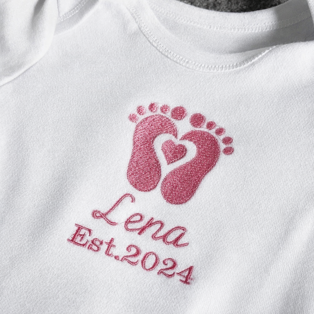 Embroidered footprint baby onesie by Rebel Needleworks - personalised custom newborn gift UK