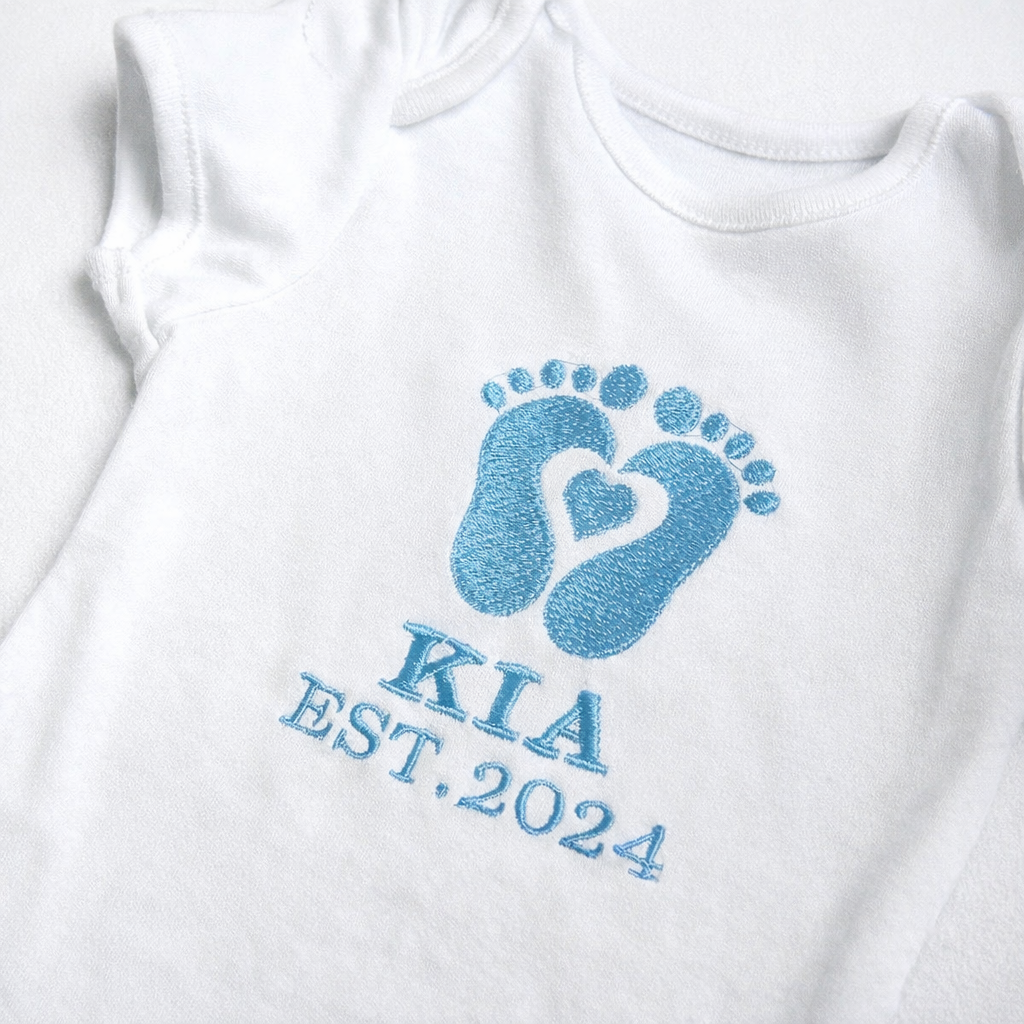 Rebel Needleworks personalised footprint baby grow - embroidered custom name newborn gift UK