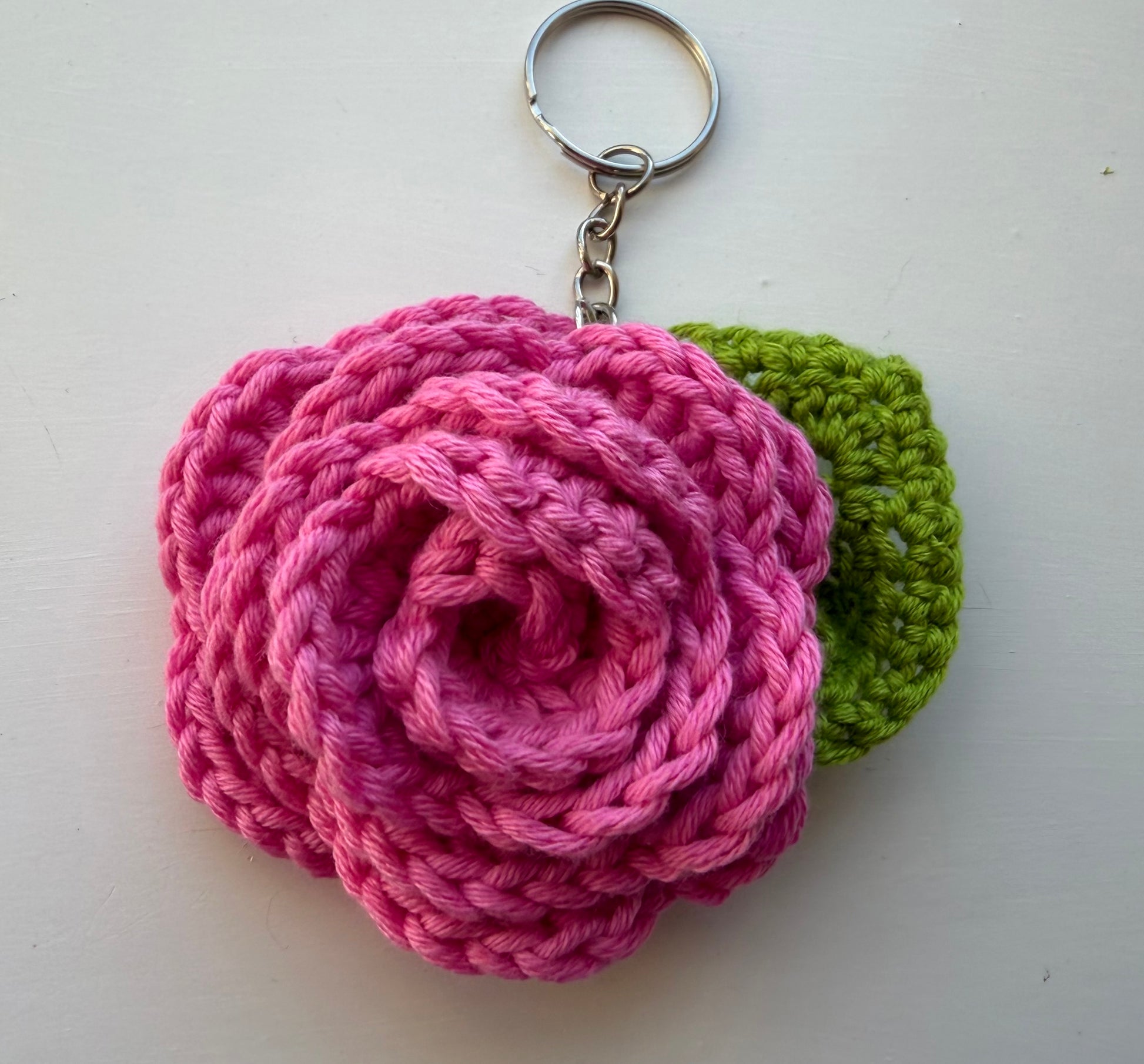 Handmade crochet rose flower keyring by Rebel Needleworks - cute leaf bag charm UK