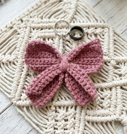 Custom crochet bow keyring by Rebel Needleworks - handmade bag charm gift UK