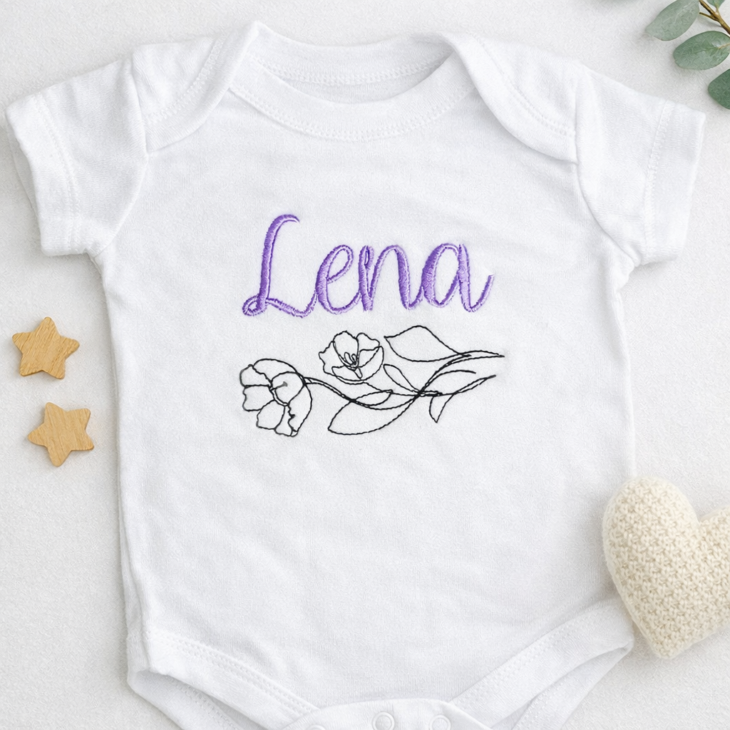 Personalised flower line art baby grow by Rebel Needleworks - custom embroidered newborn gift UK