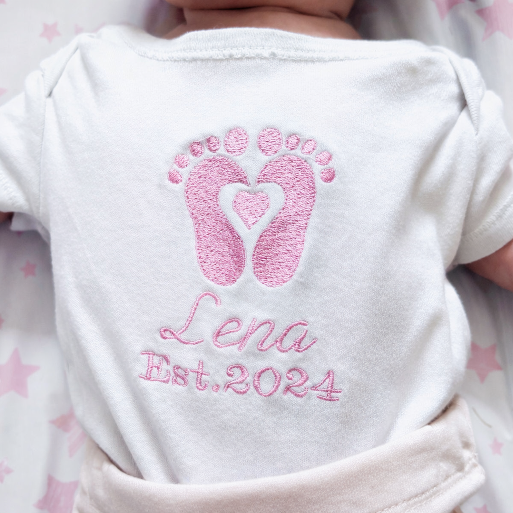 Custom footprint embroidered baby grow by Rebel Needleworks - personalised newborn baby keepsake UK