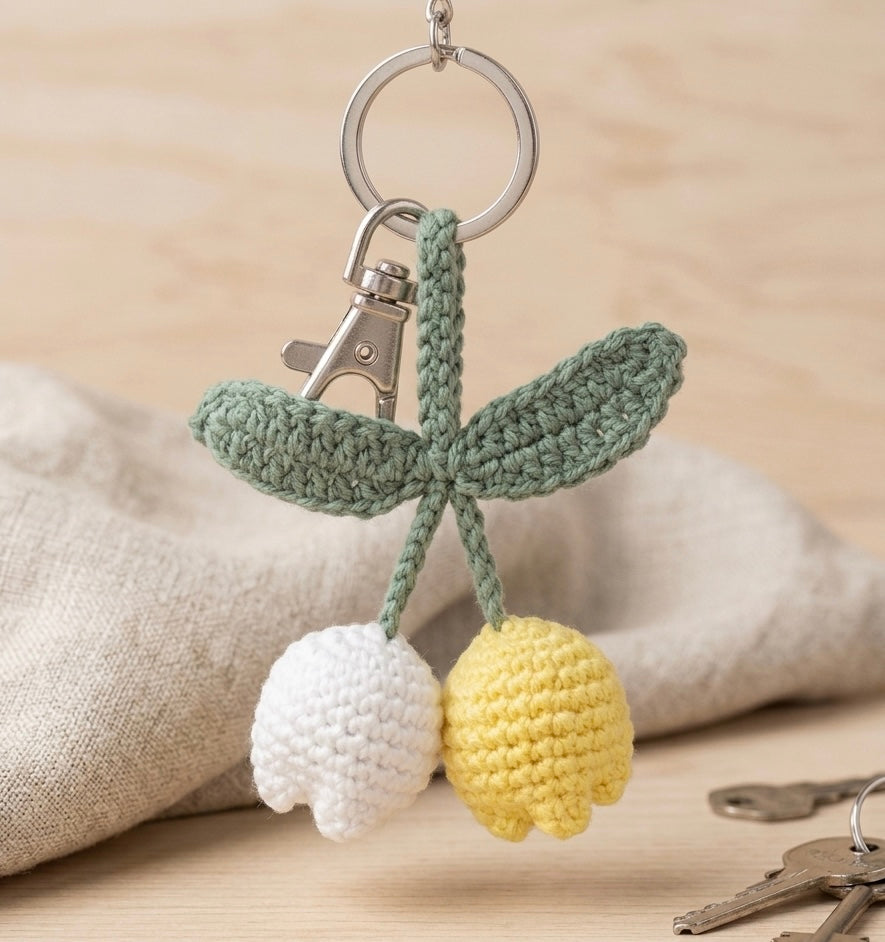 Handmade crochet tulip bag charm by Rebel Needleworks - cute flower keyring UK