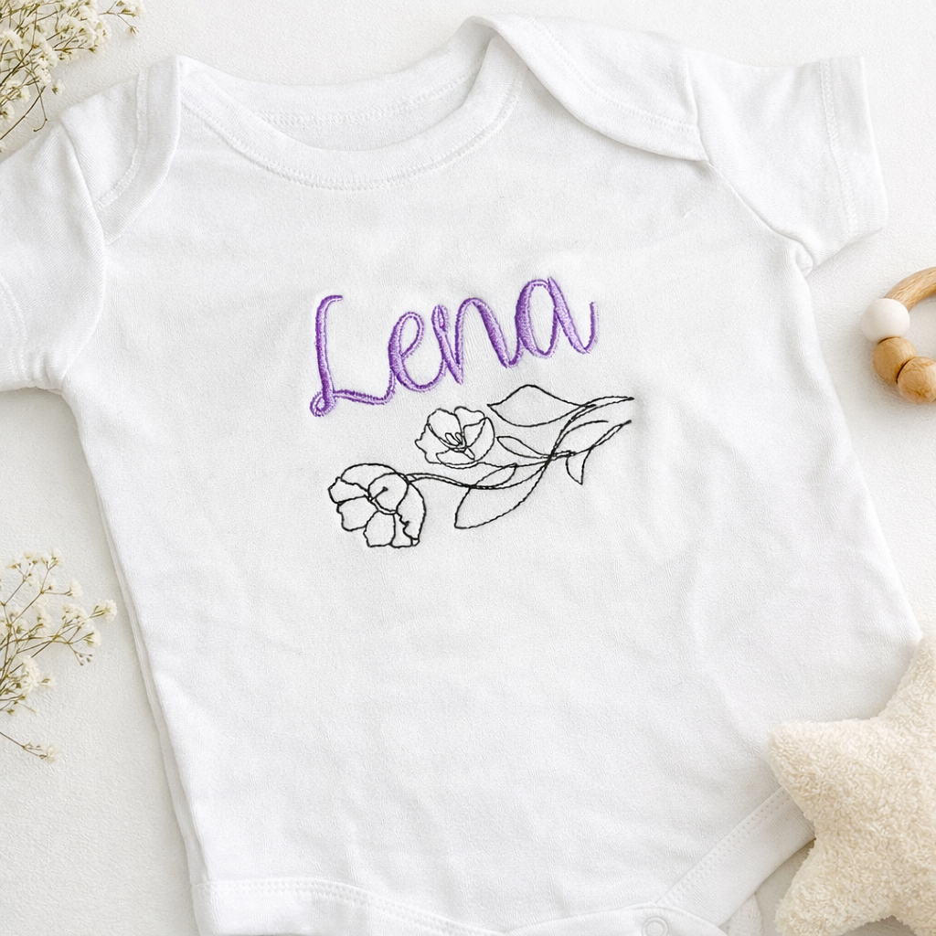 Rebel Needleworks personalised floral line art baby grow - custom embroidered newborn gift UK
