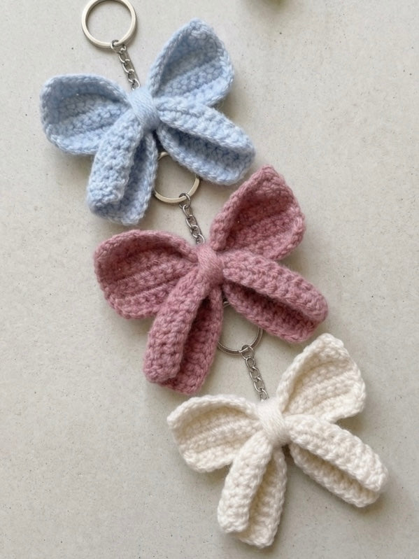 Cute handmade crochet bow keyring by Rebel Needleworks - bag charm accessory UK