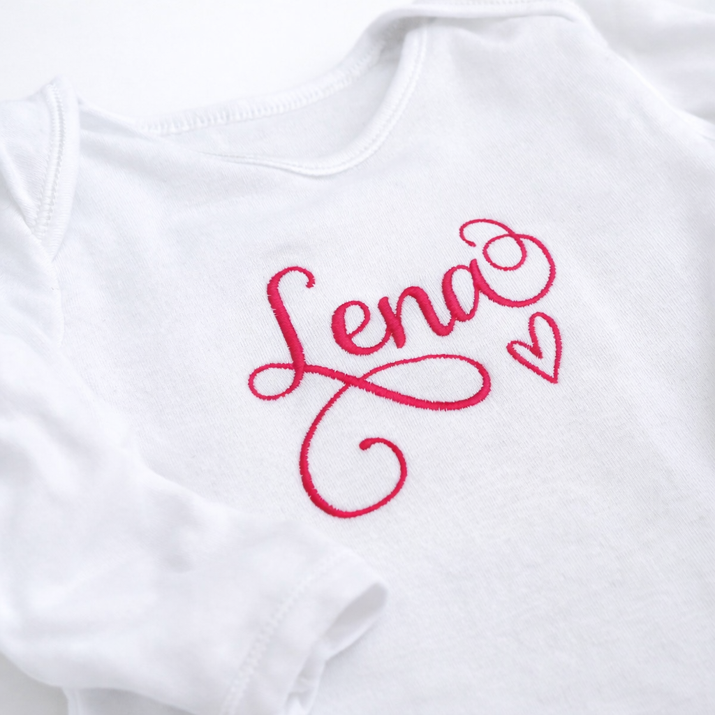 Custom script name embroidered baby grow by Rebel Needleworks - personalised newborn gift UK