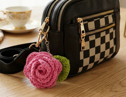 Handmade rose flower and leaf keyring by Rebel Needleworks - crochet bag charm accessory UK