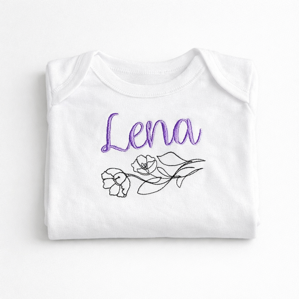 Custom flower line art embroidered baby grow by Rebel Needleworks - personalised baby gift UK