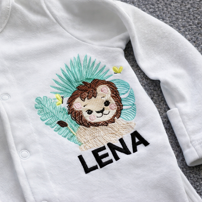 Custom safari lion embroidered sleepsuit by Rebel Needleworks - personalised baby gift UK