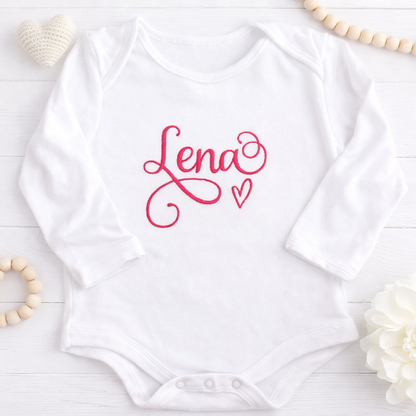 Embroidered personalised script name baby grow by Rebel Needleworks - custom newborn gift UK