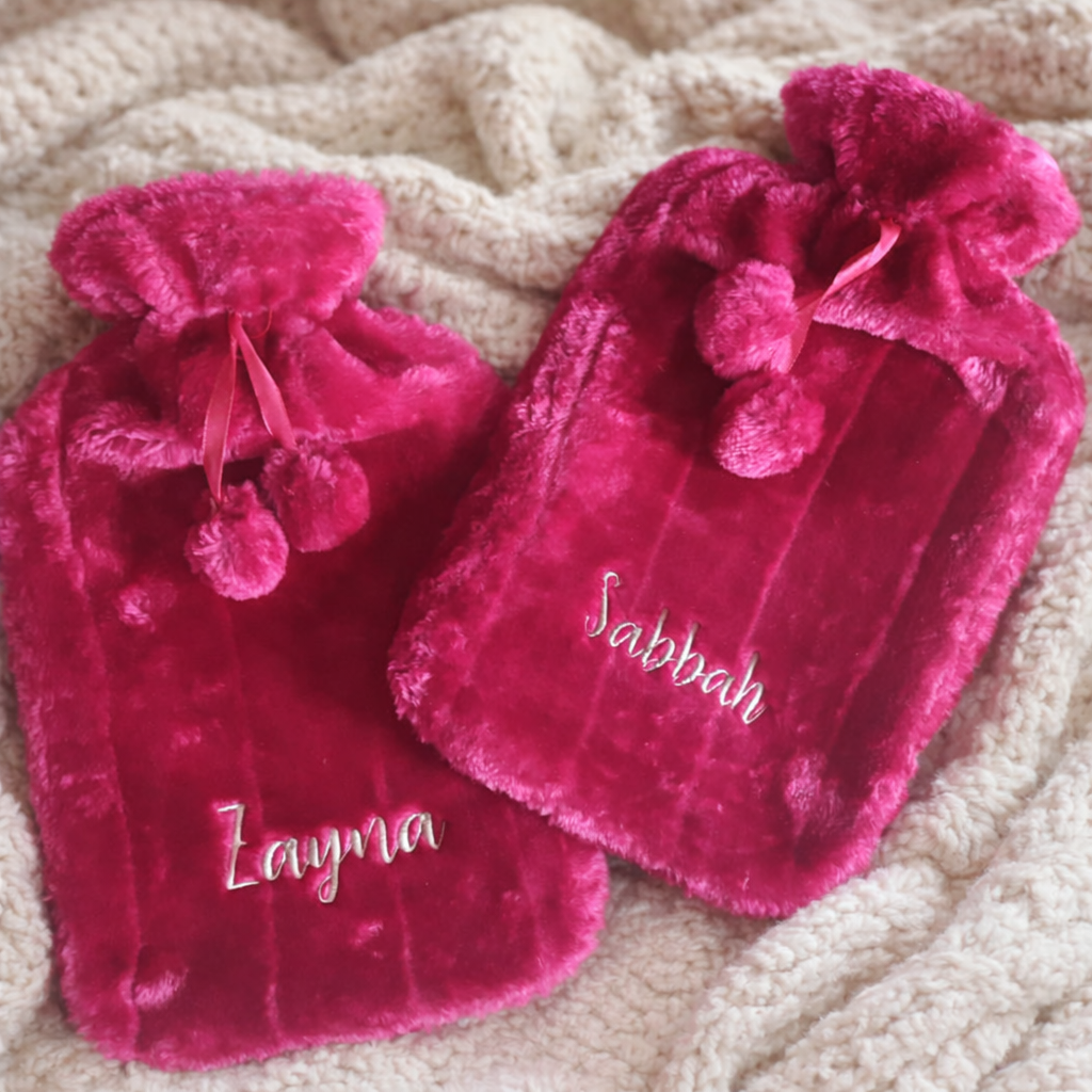 Custom embroidered knitted hot water bottle by Rebel Needleworks - personalised cosy gift UK