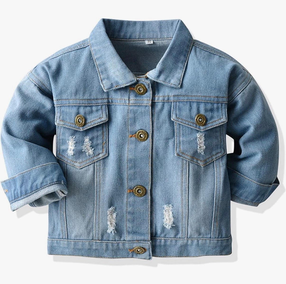 Blue denim jacket with distressed details on a white background