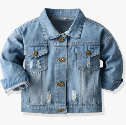 Blue denim jacket with distressed details on a white background