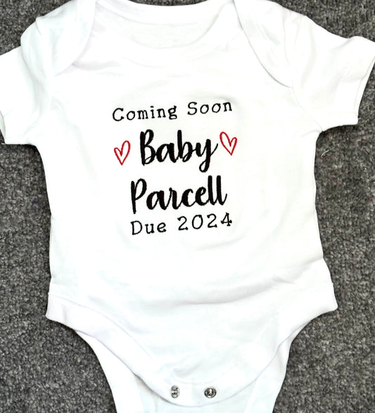 Pregnancy announcement baby grow 