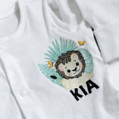 Safari lion embroidered personalised sleepsuit by Rebel Needleworks - custom baby gift UK
