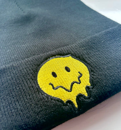 Embroidered melting smiley beanie hat by Rebel Needleworks - alternative custom hat UK