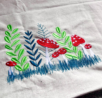 Mushrooms and wildflowers embroidered cotton shopper by Rebel Needleworks - boho tote bag UK