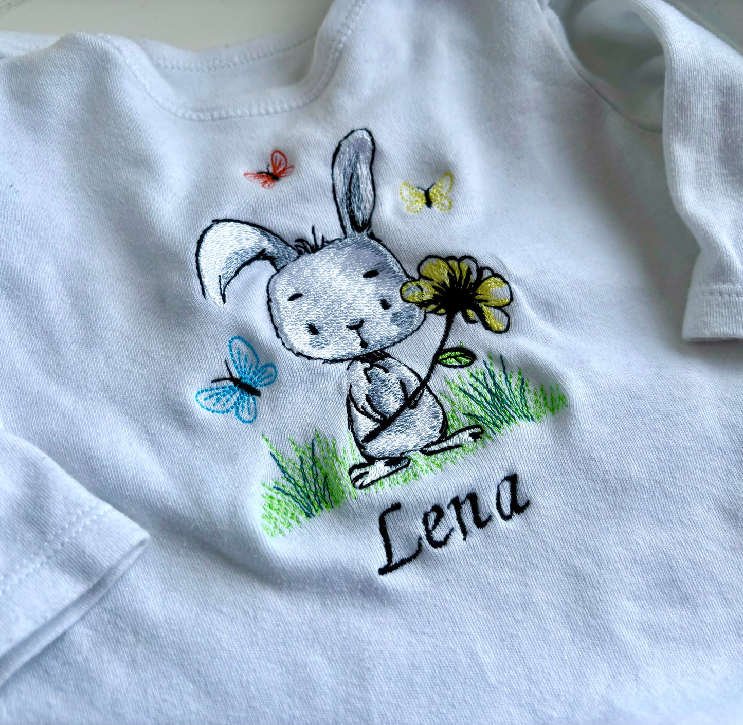 Embroidered bunny baby grow 