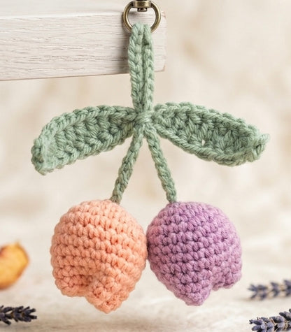 Custom crochet tulip keyring by Rebel Needleworks - handmade flower bag charm UK