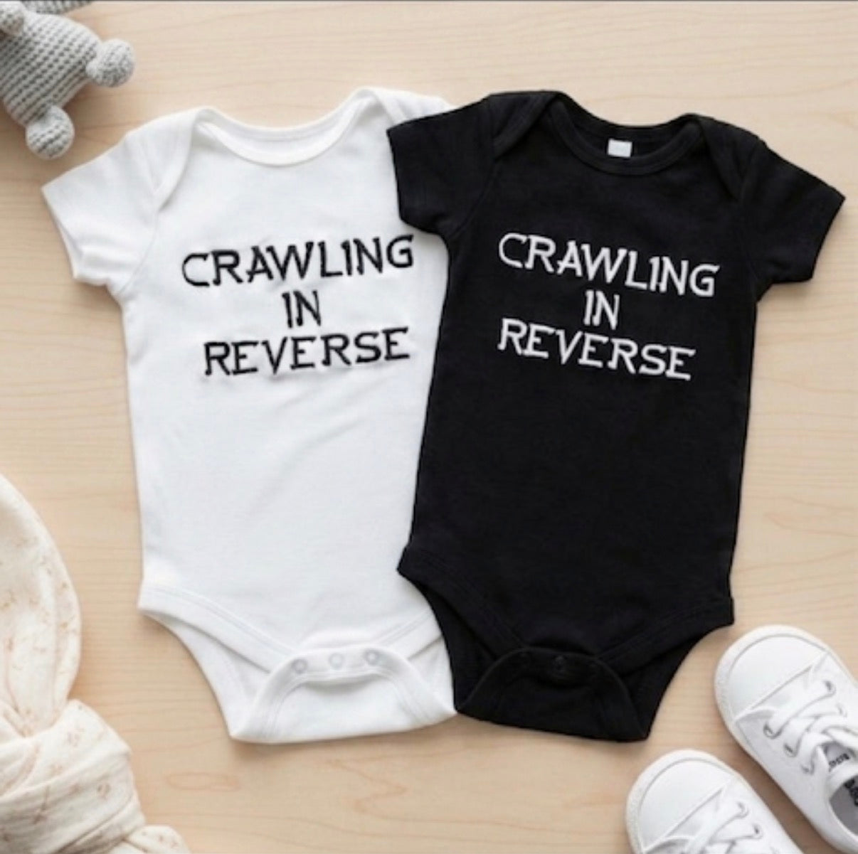 Crawling In Reverse Embroidered Baby Grow