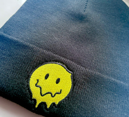 Rebel Needleworks melting smiley face embroidered cuffed beanie - alternative fun hat UK
