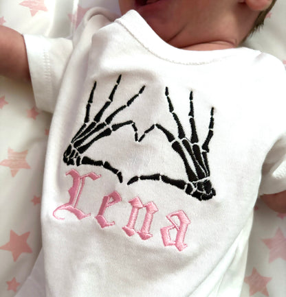 Custom skeleton heart embroidered baby grow by Rebel Needleworks - alternative gothic baby gift UK
