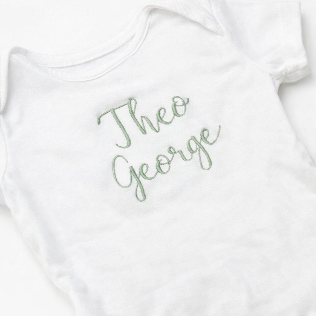 Custom name embroidered baby grow by Rebel Needleworks - personalised newborn gift UK