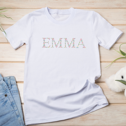 Kids floral letter name embroidered t-shirt by Rebel Needleworks - personalised children name top UK