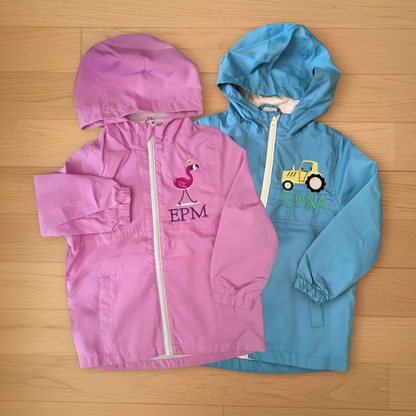 Embroidered personalised kids raincoat by Rebel Needleworks - custom name children rain jacket UK