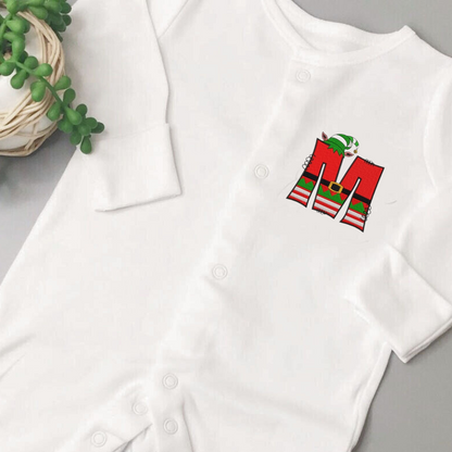 Custom elf letter embroidered sleepsuit by Rebel Needleworks - personalised Christmas baby gift UK