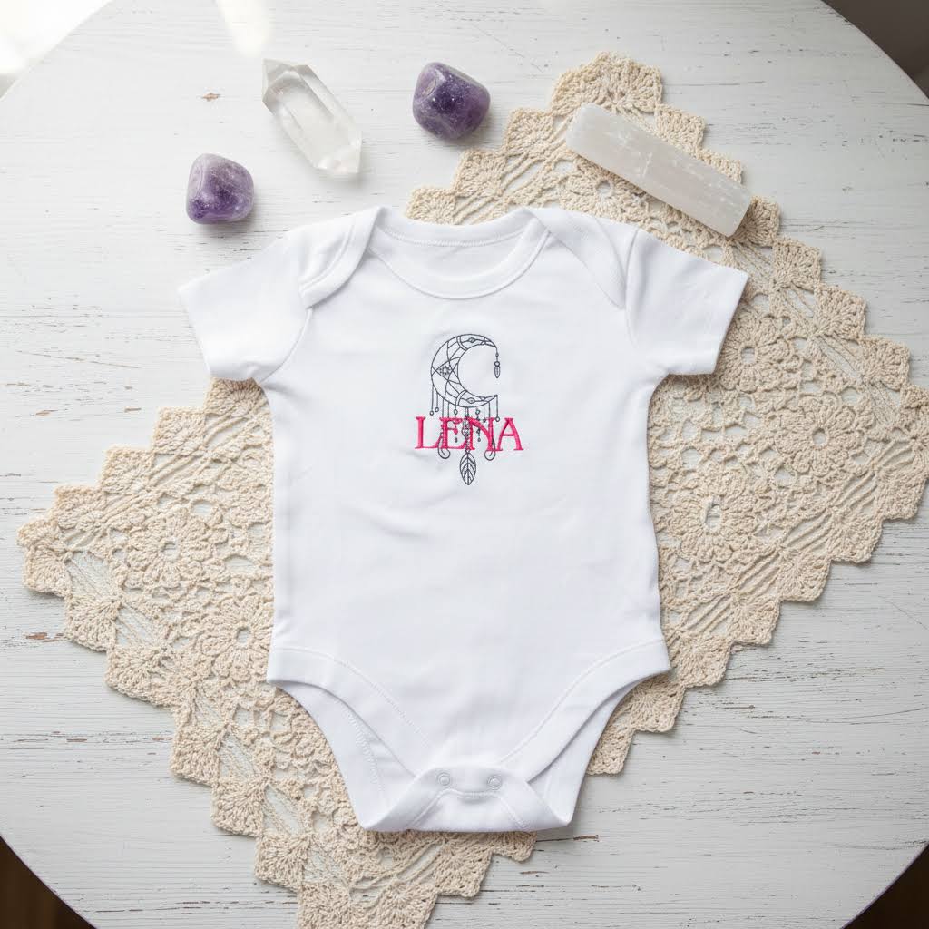 Personalised dreamcatcher baby grow by Rebel Needleworks - custom embroidered boho newborn gift UK