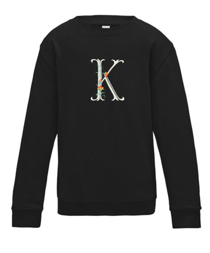 Personalised flower initial embroidered kids sweatshirt by Rebel Needleworks - custom name children jumper UK