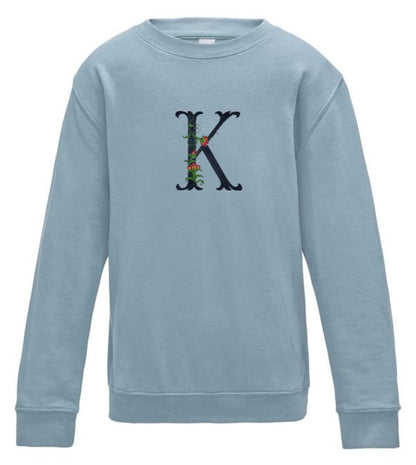 Custom embroidered initial kids sweatshirt by Rebel Needleworks - personalised flower design children jumper UK